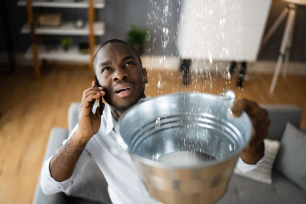 Best Flooded house restoration  in Okauchee Lake, WI